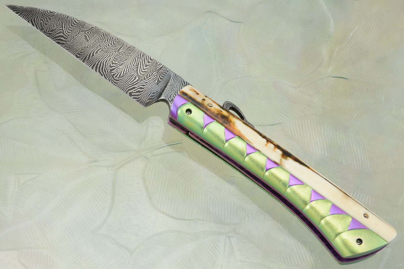 Damascus Wharncliffe with Sculpted Walrus Ivory and Titanium