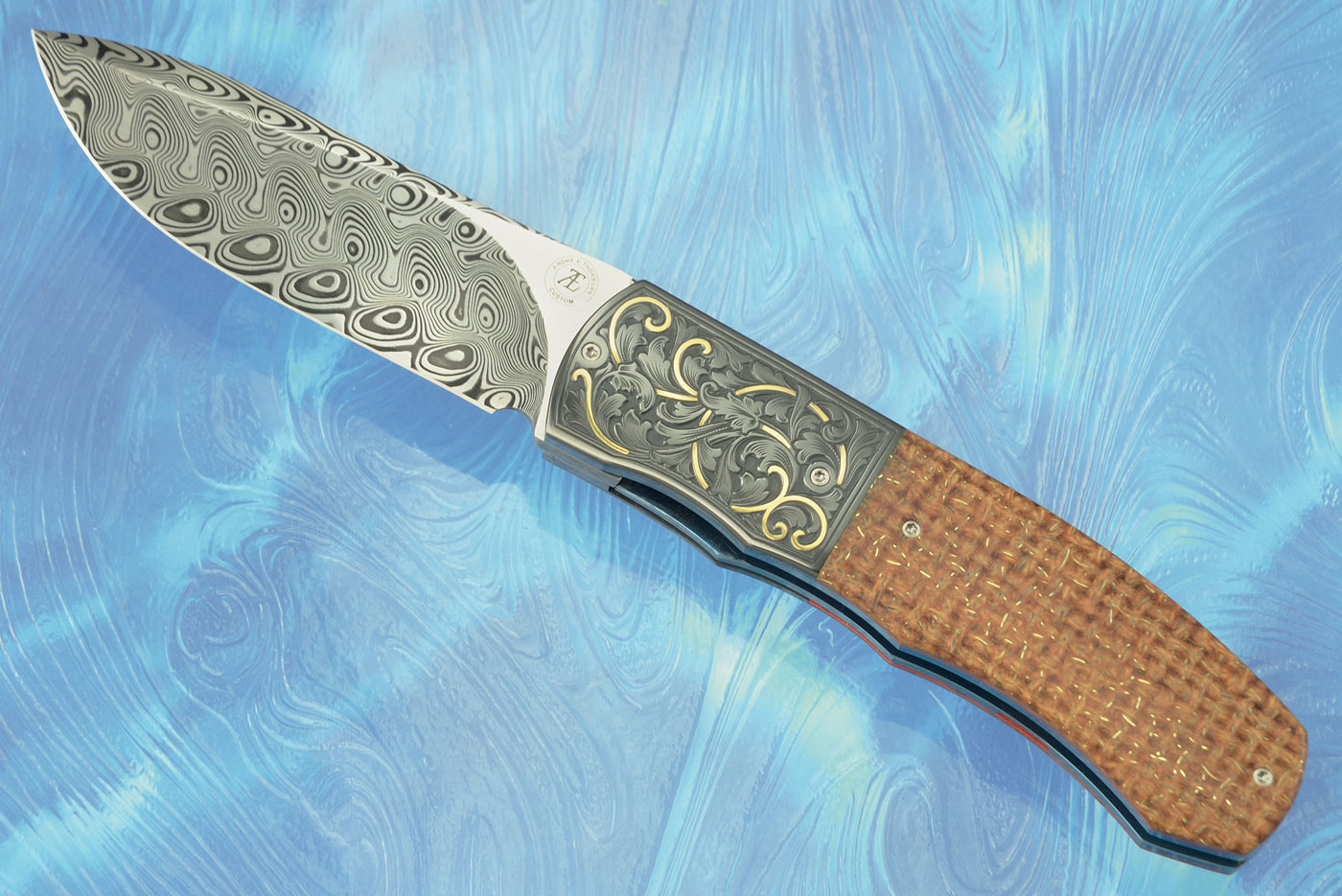 L46 Front Flipper with Thunderstorm Kevlar and Engraved Zirconium with Gold Inlay (Ceramic IKBS)
