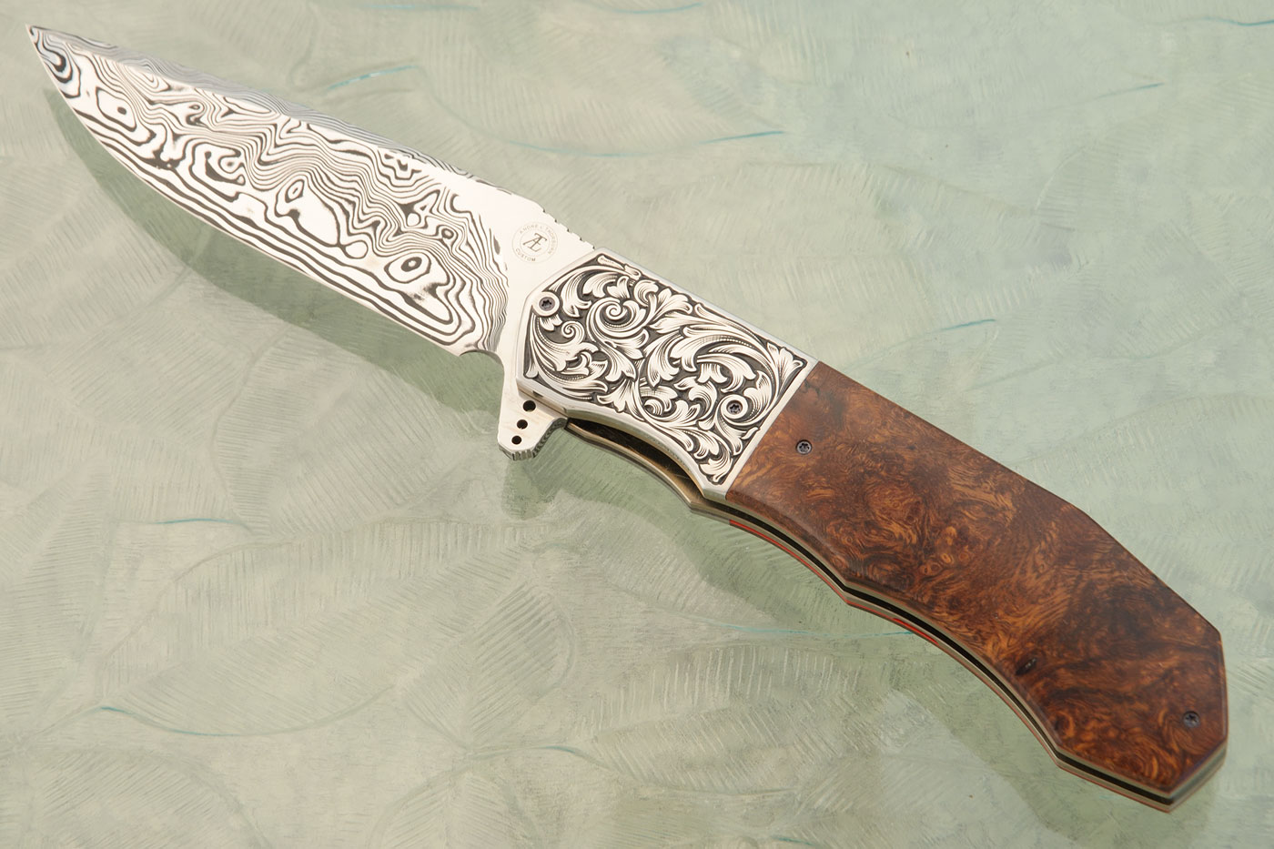 L44M Flipper with Ironwood, Engraved Bolsters, and Damascus (Ceramic IKBS)