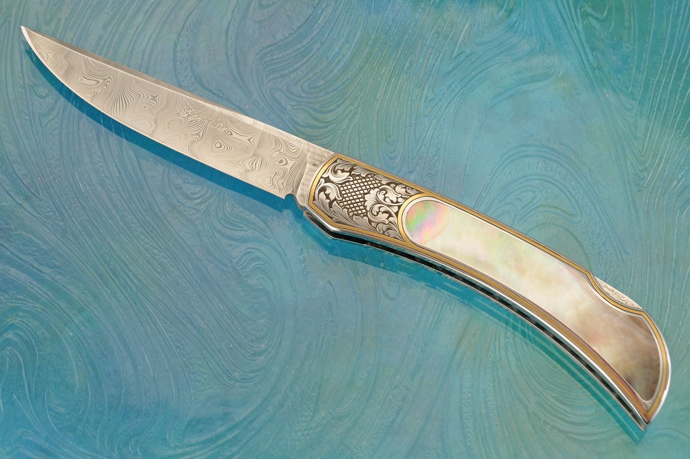 Engraved Backlock Interframe Folder with Blacklip Mother of Pearl and Damascus