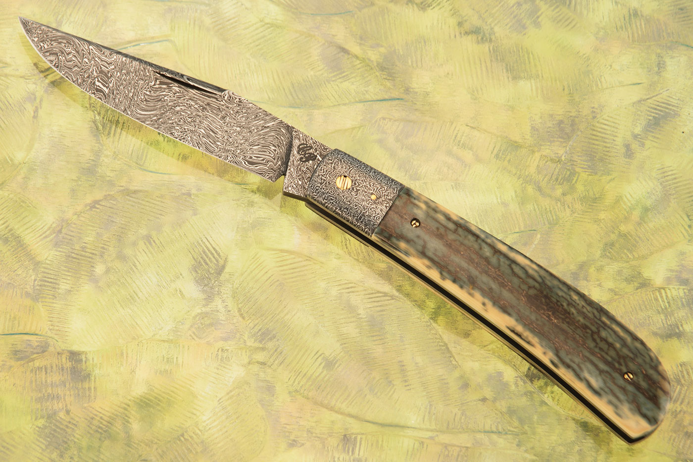 Damascus Slipjoint Trapper with Mammoth Ivory