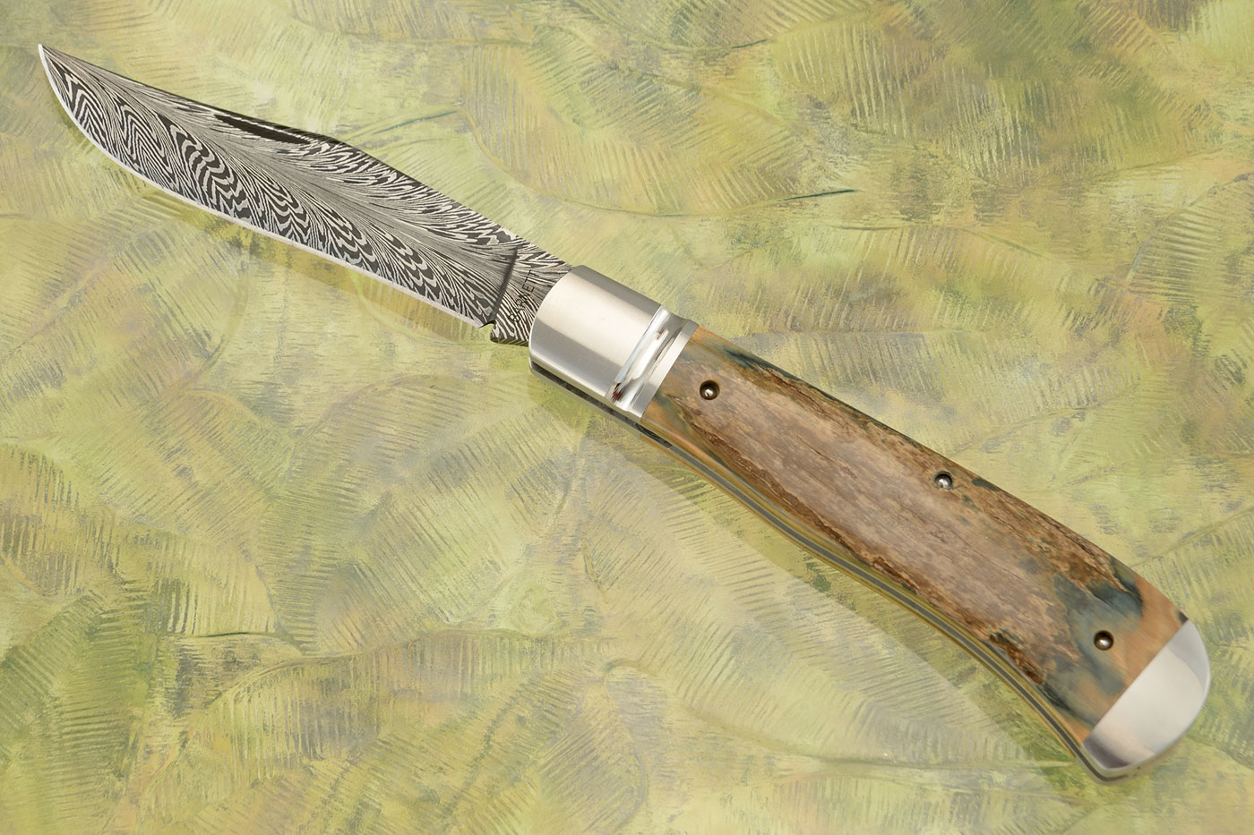 Feather Damascus Slipjoint Texas Trapper with Mammoth Ivory