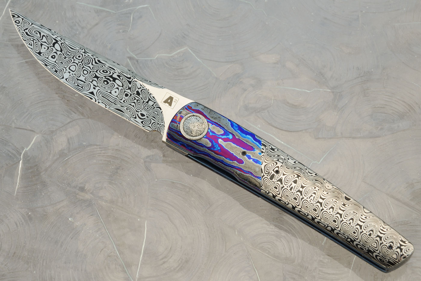 A10 Dress Front Flipper with Damasteel and Black Timascus (Ceramic IKBS)
