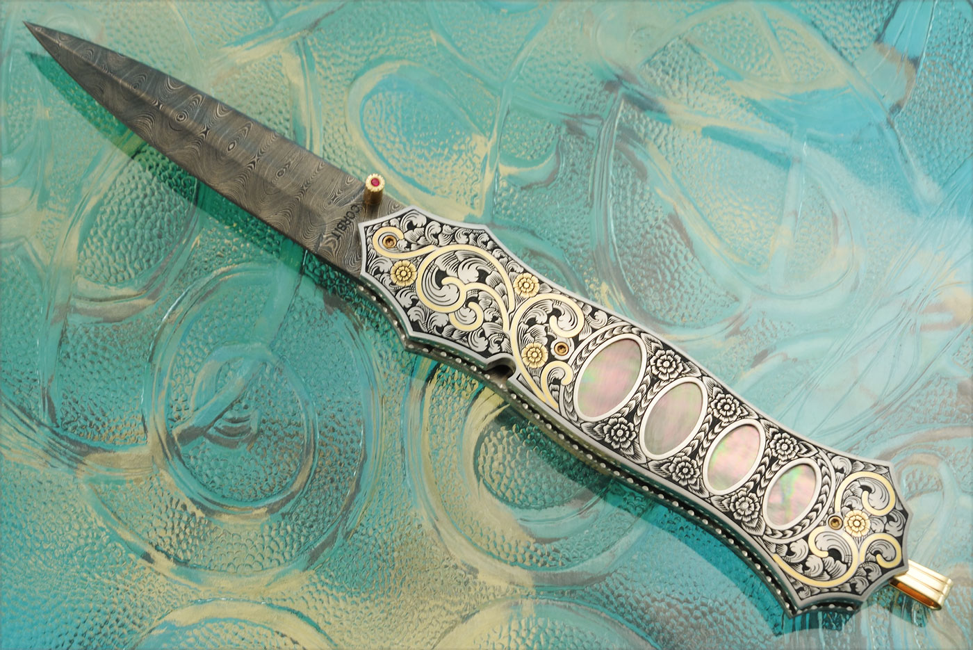 Damascus Engraved Folder with Blacklip Mother of Pearl