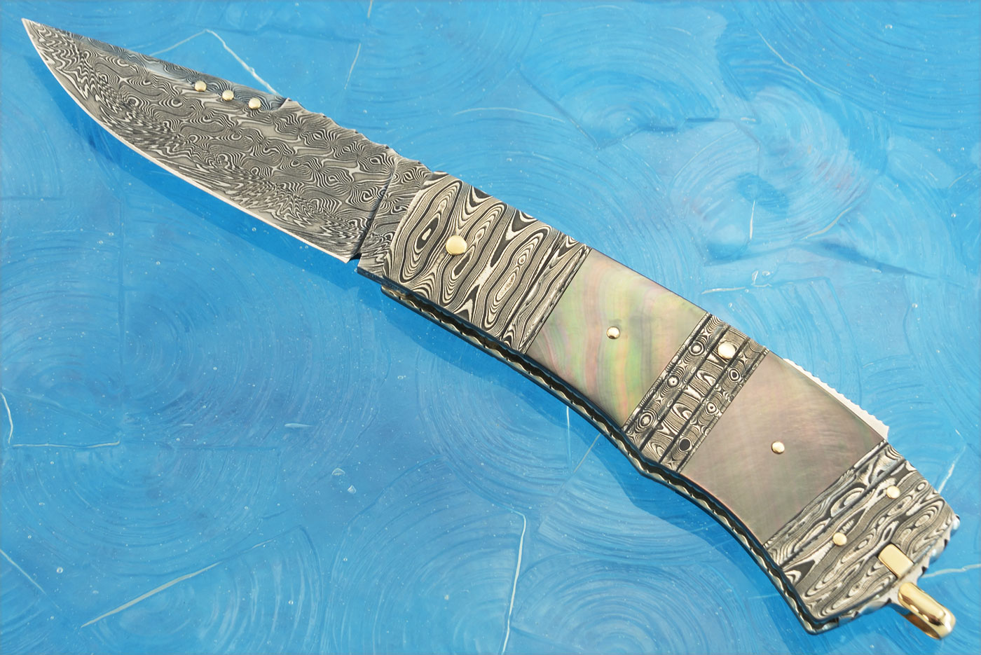 Damascus Backlock with Blacklip Mother of Pearl and Gold Toothpick