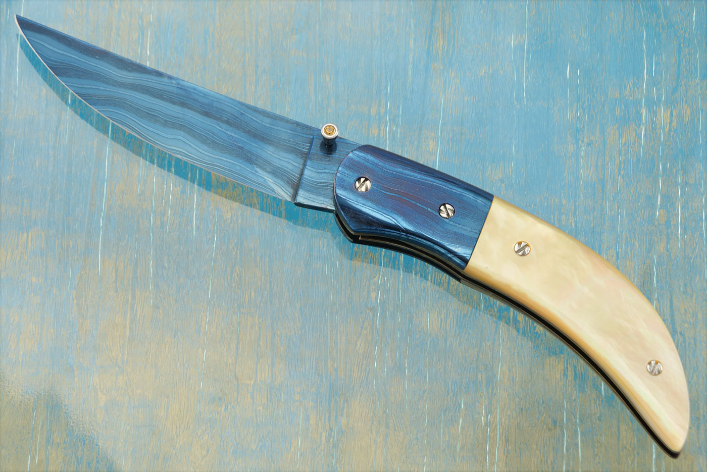Blued Damascus Linerlock Folder with Goldlip Mother of Pearl