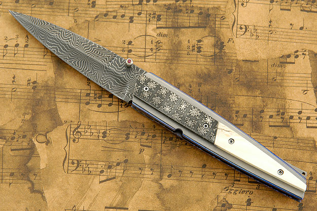 D'Lete with Warthog Tusk and Damascus