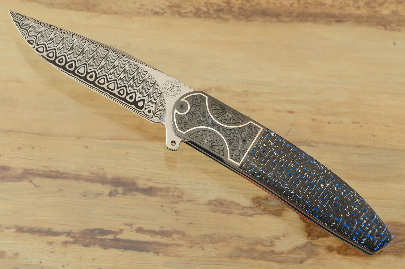 L28M Flipper with Damasteel, Blue/Silver Carbon Fiber, and Engraved Zirconium with Silver Inlay (Ceramic IKBS)