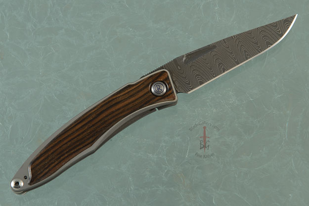 Mnandi with Macassar Ebony and Laddered Damascus - Left Handed